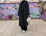 Manteau en laine capuche modulable